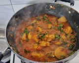A picture of step 5 of Aloo palakh.