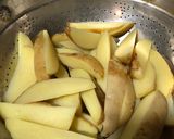 A picture of step 3 of Simple Potato Wedges.