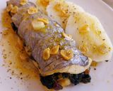 Foto del paso 13 de la receta: Merluza rellena de espinacas con langostinos y pasas