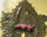 A picture of step 3 of Yaprak Sarma (stuffed grape leaves).