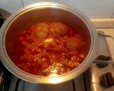 A picture of step 7 of Bread Meatballs in Tomato Sauce.