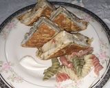 A picture of step 4 of Eggs wrapped Pasta Sandwich.