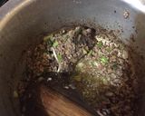 A picture of step 3 of Celery and minced meat stir fry served with rice.