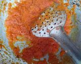 A picture of step 4 of Moong dal and posto savoury laddu curry.