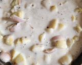 A picture of step 5 of White sauce potatoes🥔.