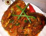 A picture of step 6 of Peppered smoked dry fish.