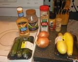 A picture of step 1 of Foil wrapped honey mustard pork loin with zucchini, squash, and baby carrots.