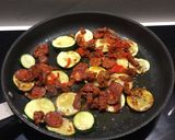 A picture of step 3 of Wholewheat pasta with sun- dried tomatoes, courgette and chorizo.