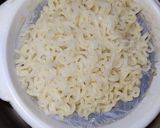 A picture of step 1 of Maggi peanut cracker in potato boat.
