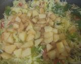 A picture of step 7 of Potato Fried Rice With Onion Rings.