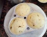 A picture of step 4 of , Chutney and tomato ketchup filled idli.