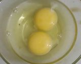 A picture of step 1 of Masala Omelette.