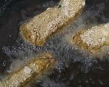 A picture of step 10 of Peri bites with twist and mustard dynamite sauce.