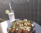 Foto langkah ke 8 dari resep Crostini ai peperoni, olive, burrata e basilico (toasts with peppers, olives, burrata and basil).