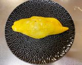 A picture of step 4 of Omu Sandwich (Sandwich wrapped with egg fry).