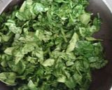 A picture of step 1 of Moogdal with spinach.