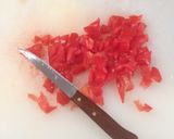 A picture of step 4 of Seafood Saganaki.