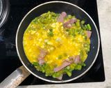 A picture of step 3 of Quick asparagus, bacon & feta scramble.