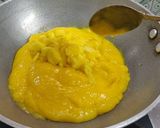 A picture of step 2 of Layered mango lassi.