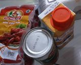 A picture of step 1 of Tomato Sausage Soup.