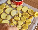 Foto del paso 3 de la receta: Patatas onduladas al horno- toque italiano