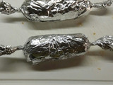 Chorizos rellenos con guarnición