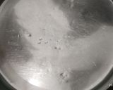 A picture of step 3 of Peanut and sesame seed chikki.