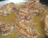 A picture of step 3 of Chicken spicy wings.