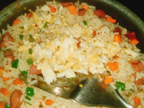 Vegetable stir fried rice with sausages