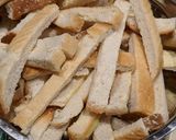 A picture of step 2 of Leftover Bread crust pudding - bread and butter.