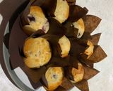 A picture of step 6 of Lemon and blueberry drizzle muffins.