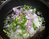 Foto del paso 3 de la receta: Arroz con jugos de cigalas, almejas y pimientos tipo padrón