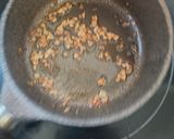 A picture of step 1 of Riceberry Rice Porridge with Chicken Thigh.
