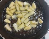 A picture of step 2 of Achary masala ladyfingers potato.