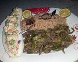 A picture of step 9 of Kilishi rice and green shredded beef.