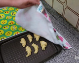 Foto del paso 8 de la receta: Medias lunas o Croissant masa casera / rellenos de dulce de leche