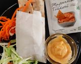 A picture of step 5 of Tandoori roti wrap.