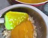 A picture of step 4 of Mango flavoured milk cake in two layers.