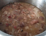 Foto del paso 7 de la receta: Manitas de cerdo con tomate, jamón y morro