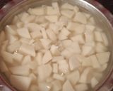 A picture of step 1 of Falahaari potatoes.