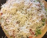 A picture of step 4 of Garden fresh Pita Pizza.