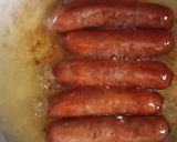 A picture of step 3 of Sumptuos Fried Beef Sausages using very little oil.