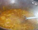 A picture of step 3 of Potato veg with pooris.