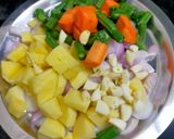 A picture of step 1 of Multi Grain Healthy Vegetable Khichdi.