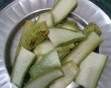A picture of step 1 of Ridge gourd fritters(Nenua (taroi)ke pakore).