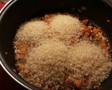 Foto del paso 8 de la receta: Arroz con coquinas y huevas de jurelillos blancos
