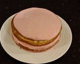 A picture of step 27 of White Chocolate Layer Cake Filled with Strawberry Mousse and Frosted with Whipped Strawberry White Chocolate Ganache.