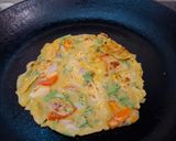 A picture of step 3 of Sattu dosa.