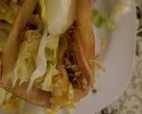 A picture of step 3 of Crockpot Chicken Tacos in a Crispy Shell.