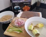Foto del paso 1 de la receta Arroz integral con rape, ajetes y alcachofas (para vagos)